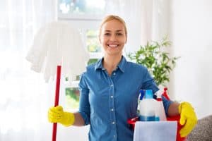 woman with mop and cleaning bucket