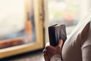 Woman holding bible